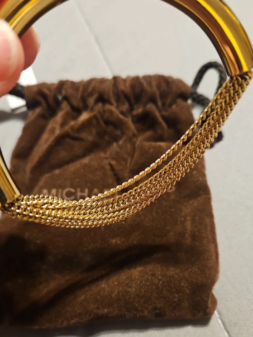 Michael Kors gold tone